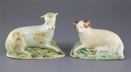 A Staffordshire creamware figure of a recumbent ram and a similar ewe